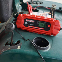 Voltflow VF10BC 12v Car Battery Charger mounted on a ride-on lawn mower.